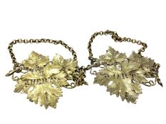 A very fine pair of ornate large silver gilt decanter labels, heavily cast for Sherry and Port,