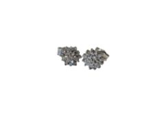 A pair of diamond cluster stud earrings