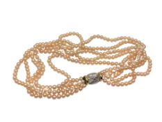 A good quality 15 inch five strand pearl necklace on two tone 14ct gold catch