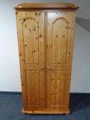 A pine double door wardrobe