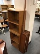 Two sets of mid 20th century teak open shelves and a teak modular shelving unit