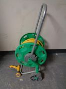 A Hozelock hose pipe on reel