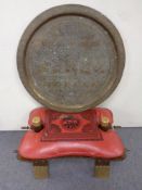 An Eastern brass tray and a camel stool