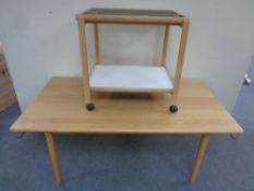 A Scandinavian coffee table and a two tier trolley