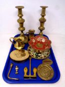 A tray of antique and later brass ware - 19th century candlesticks, miniature jugs, anchor,
