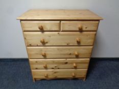 A pine six drawer chest