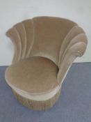 A 20th century Art Deco bedroom chair in gold dralon