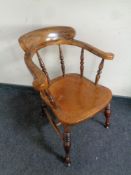 An Edwardian beech smoker's armchair