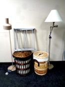 Two wicker lidded laundry baskets,