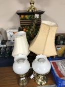 A hand painted wooden pedestal depicting fruit together with five brass table lamps with shades