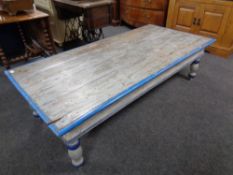 A painted pine low rectangular coffee table fitted two drawers