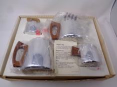 A 20th century Sona mirror finish five piece tea service in original box.