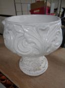 A painted concrete garden planter (white)