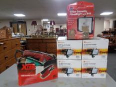 Four Kingavon LED security flood lights together with a further security flood light and an