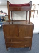 A 19th century inlaid mahogany adjustable piano stool together with a linen cabinet