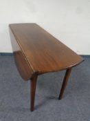 A 19th century mahogany gate legged table together with a pair of Edwardian mahogany dining chairs