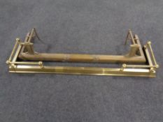 A 19th century brass Art Nouveau fire curb and a brass telescopic fire curb