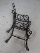 A pair of cast iron bench ends