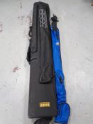 A Boss Tackle Development fishing rod bag together with a further fishing rod bag containing two