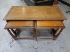 A nest of three teak G plan tables