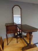 An oak sewing table on cabriole legs together with a refectory coffee table and mahogany framed