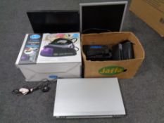 A Quest steam generator iron together with a Goodmans DVD player,