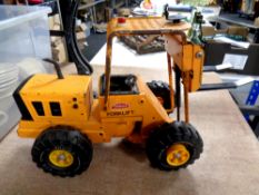 A Tonka tin plate fork lift truck