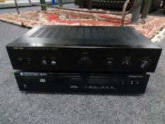 A Rotel integrated amplifier RA/920AX and a Cambridge Audio CD4 compact disc player