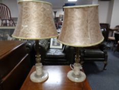 A pair of decorative brass and marble table lamps with shades