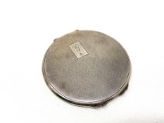 A silver compact