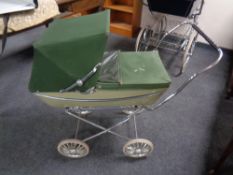 A coach built Silver Cross doll's pram (green)