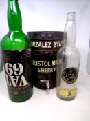 A oak coopered sherry barrel with tap bearing later sign writing : Gonzales Byass Bristol Milk