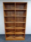 A set of 20th century teak effect open bookshelves