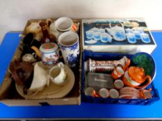A box and a basket containing assorted antique and later ceramics to include teapots,