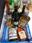 A crate of alcohol including Harvey's Pale Cream, Sandman Ruby Porto,