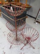 Two wrought iron garden planters