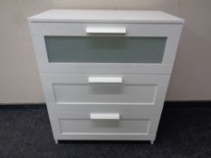 A contemporary three door chest