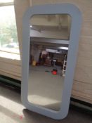 A painted framed overmantel mirror