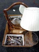 A box containing 19th century mahogany shield framed mirror on stand, brass table lamp with shade,