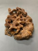 David Belilios : A wooden root carving,