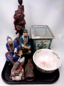 A tray containing oriental wares to include carved hard wood figural table lamp,
