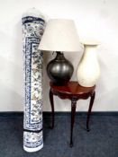 A Next woolen rug together with a demi-lune hall table in a mahogany finish,