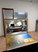 A contemporary all glass framed bevel edged mirror together with two further mirrors and a wall