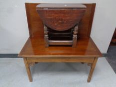 A turnover top coffee table together with a oak drop leaf occasional table
