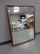 A contemporary overmantel mirror