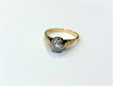 An 18ct gold solitaire diamond ring, the brilliant cut stone weighing approximately 0.