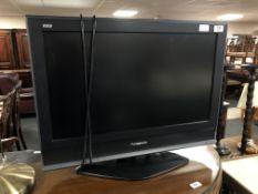 A Panasonic Model TX26-LMD70A LCD television set, with remote control.