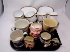 A tray containing assorted character jugs, Arthur Wood tankard, commemorative tankard,