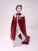 A Royal Worcester figure : The Queens 80th birthday 2006