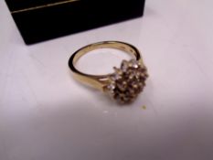 A 9ct gold diamond cluster ring